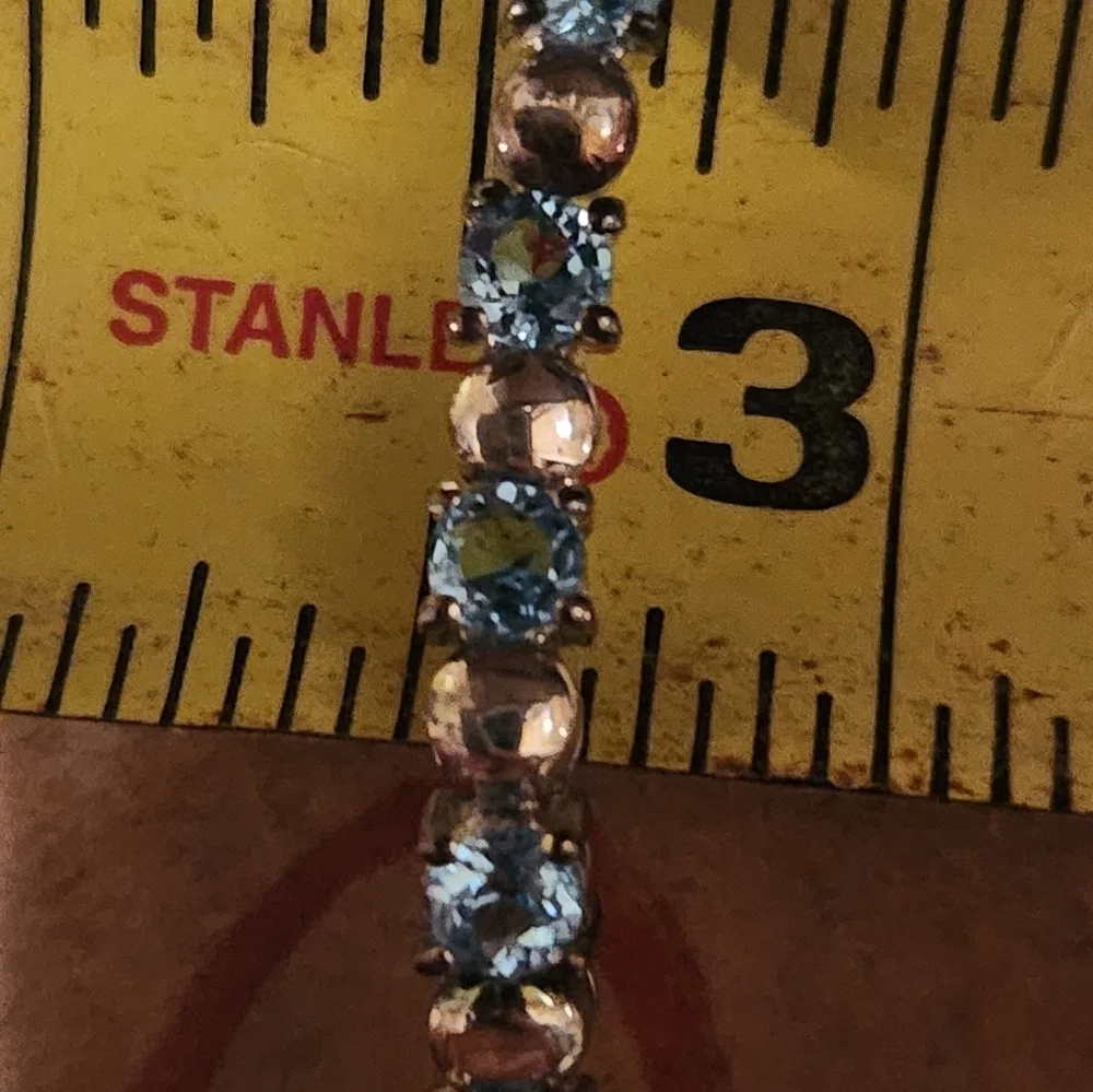 Blue topaz and silver tennis bracelet